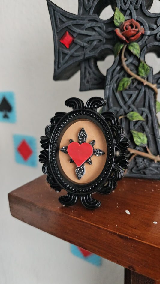 Glitter haunted hearts in frame