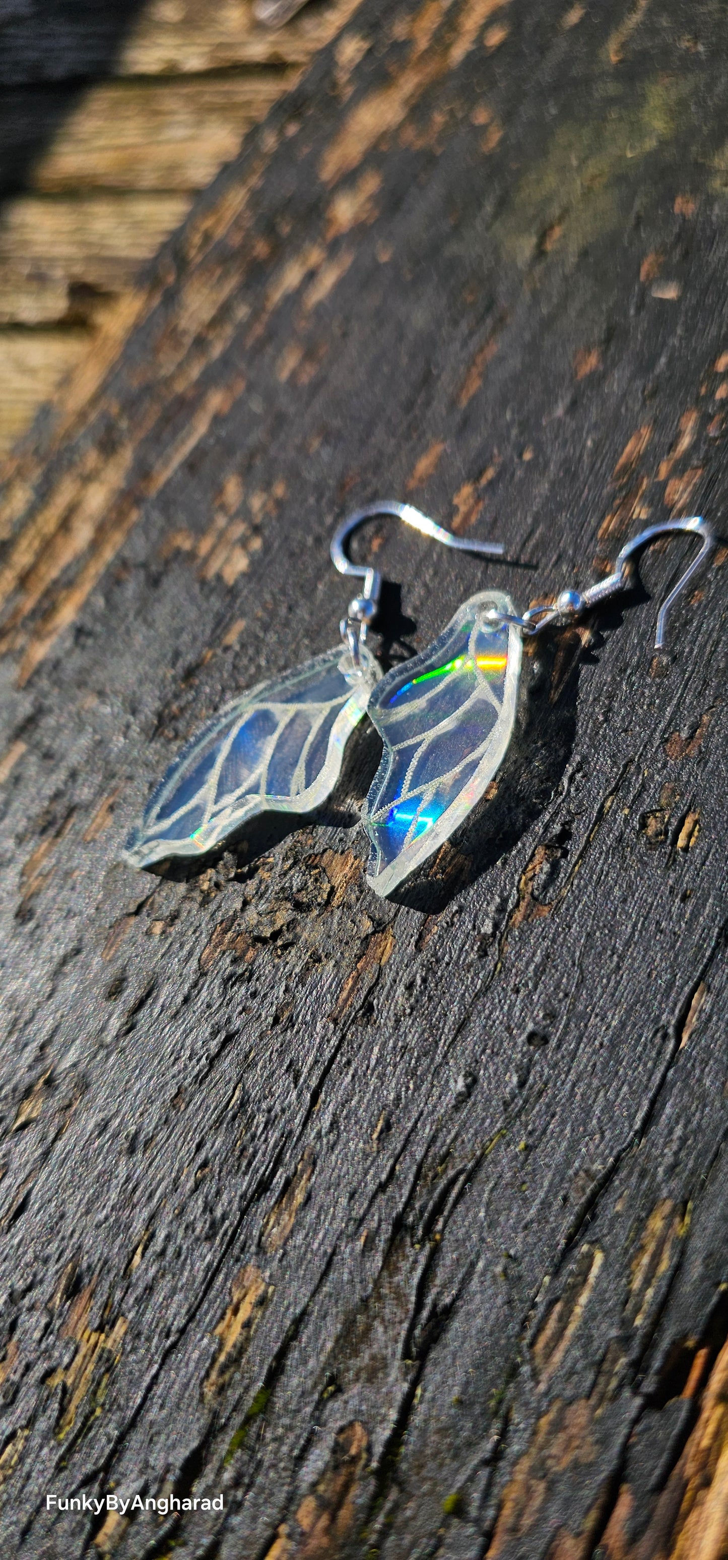 Holographic wing earrings