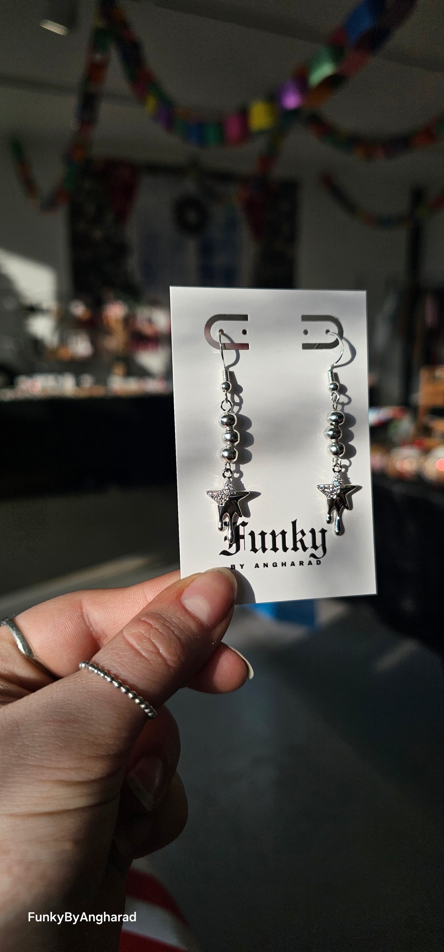 Dripping star earrings