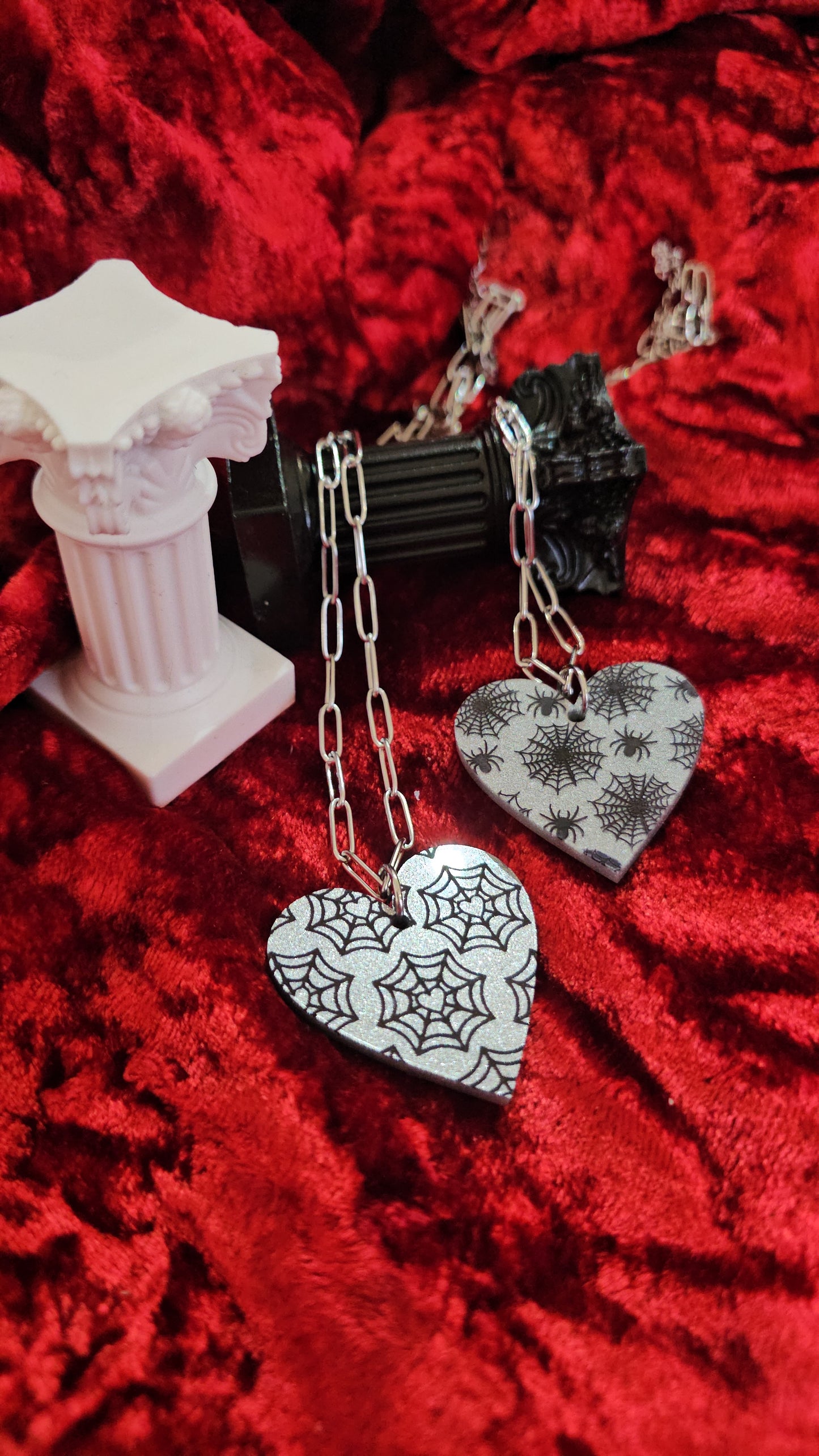 Web heart necklaces
