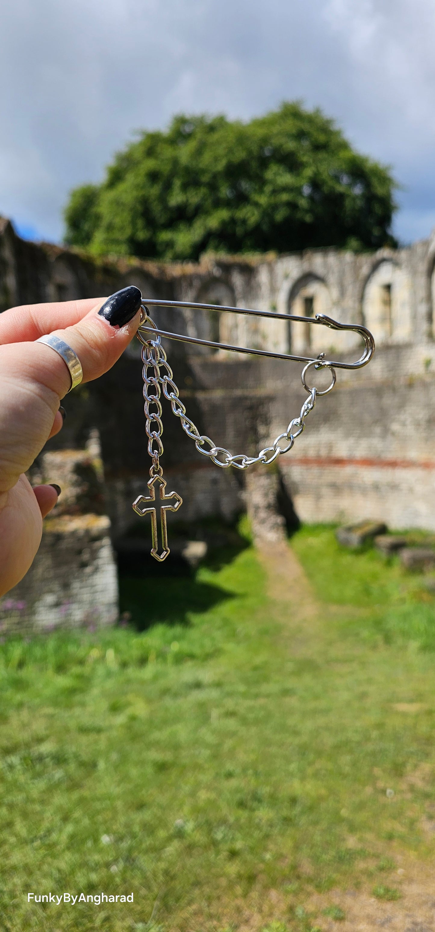 Crucifix pin