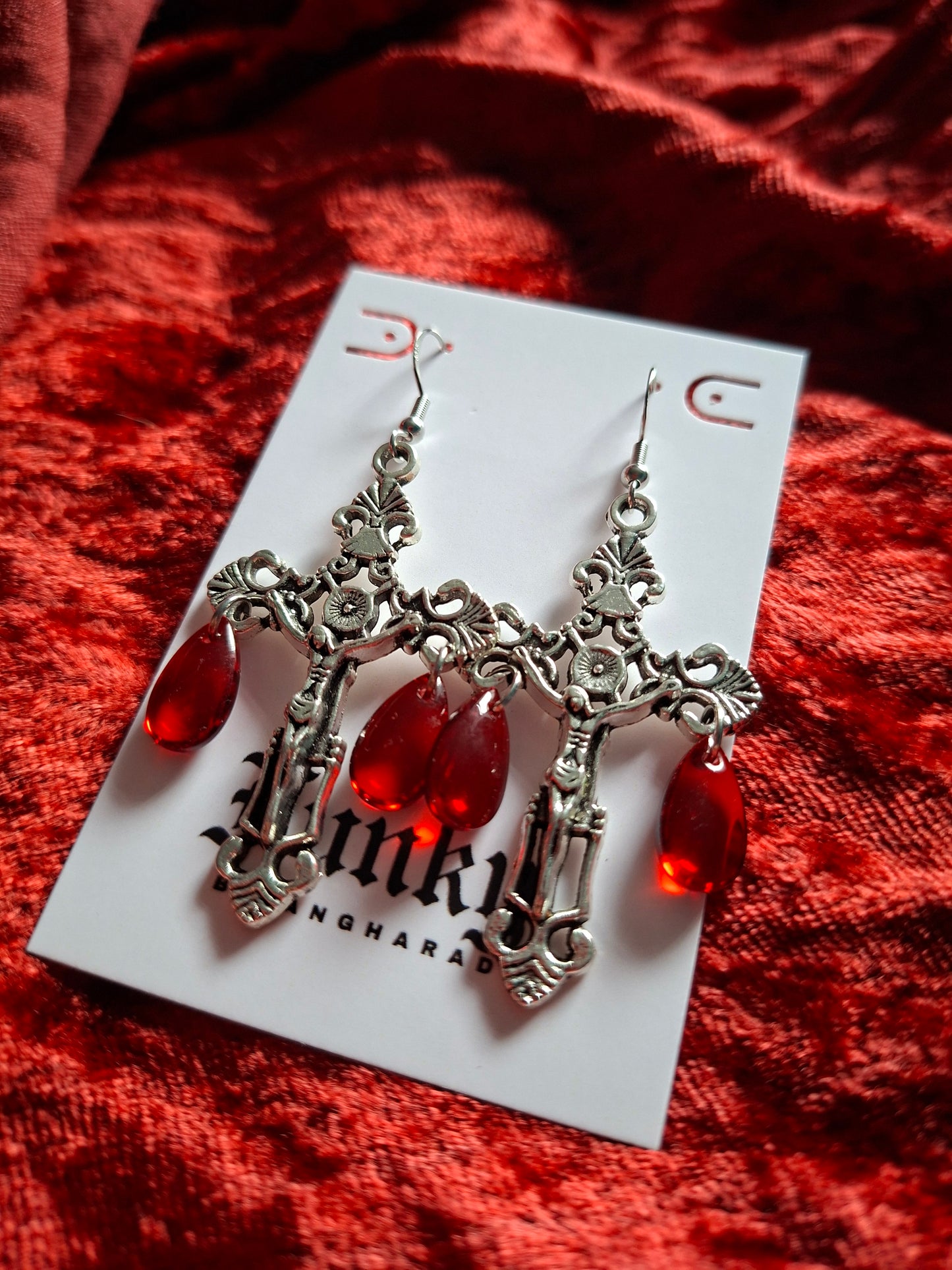 On the cross earrings