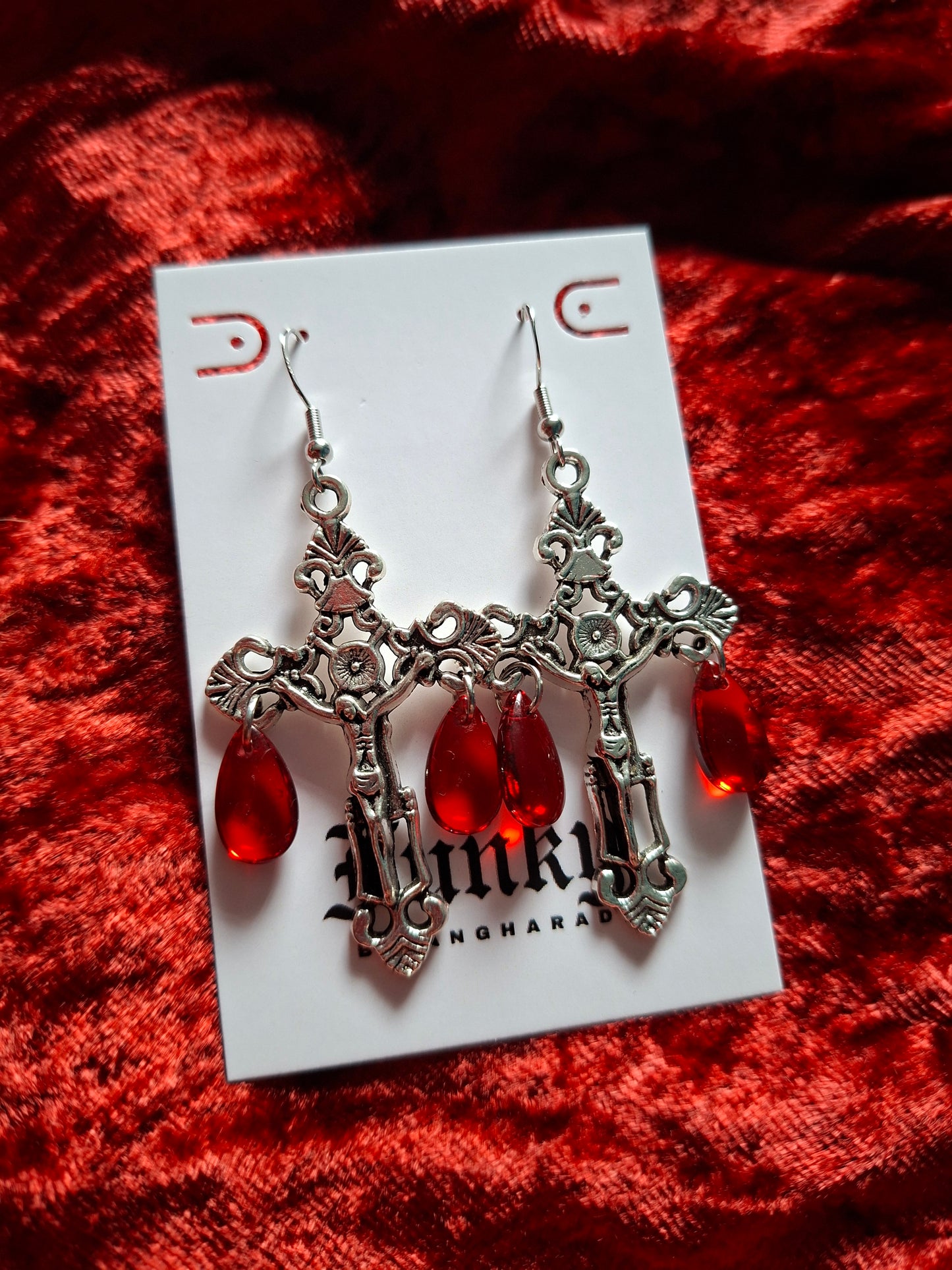 On the cross earrings