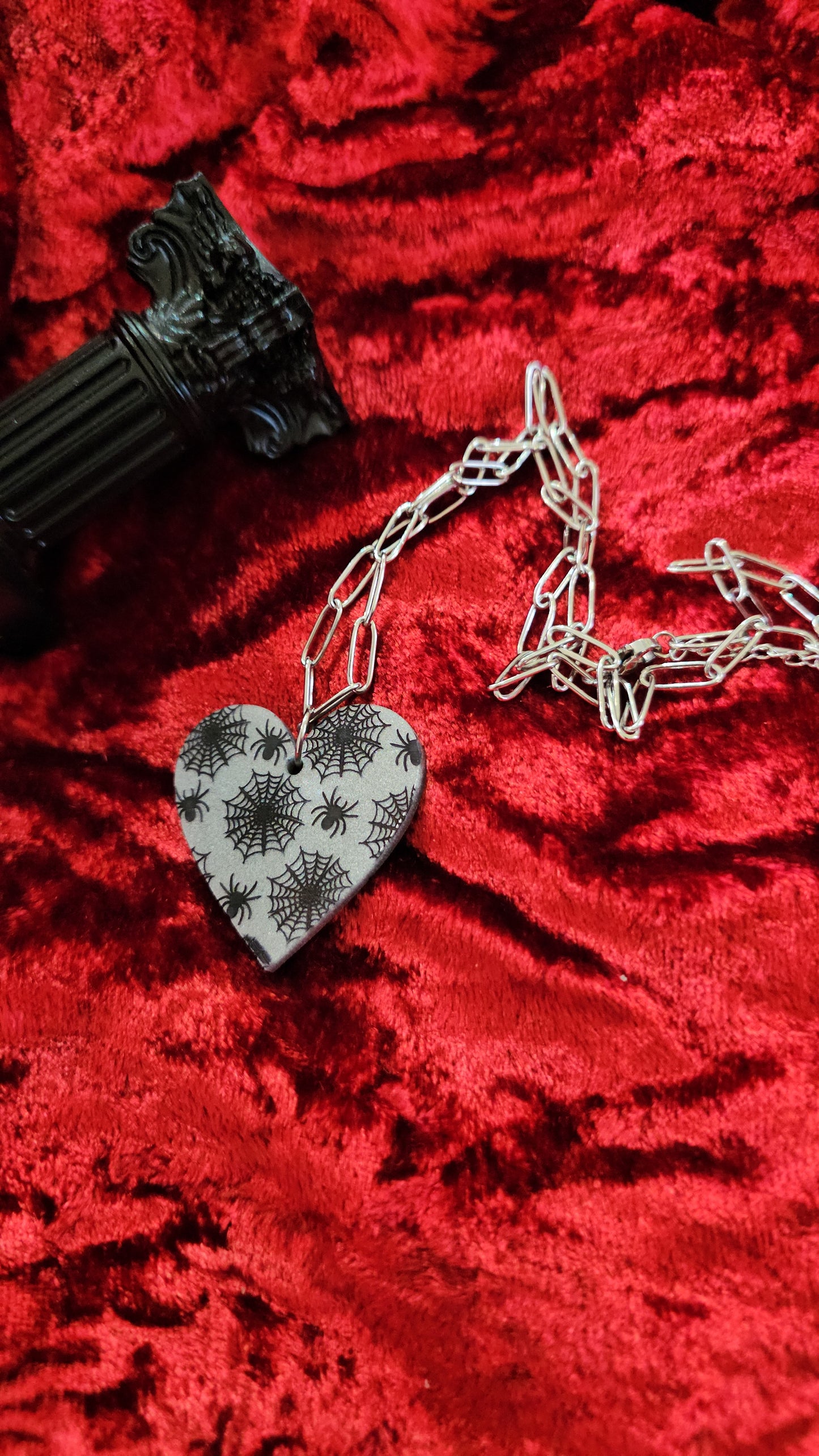 Web heart necklaces