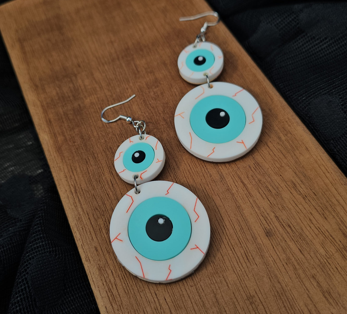 Blue eye earrings