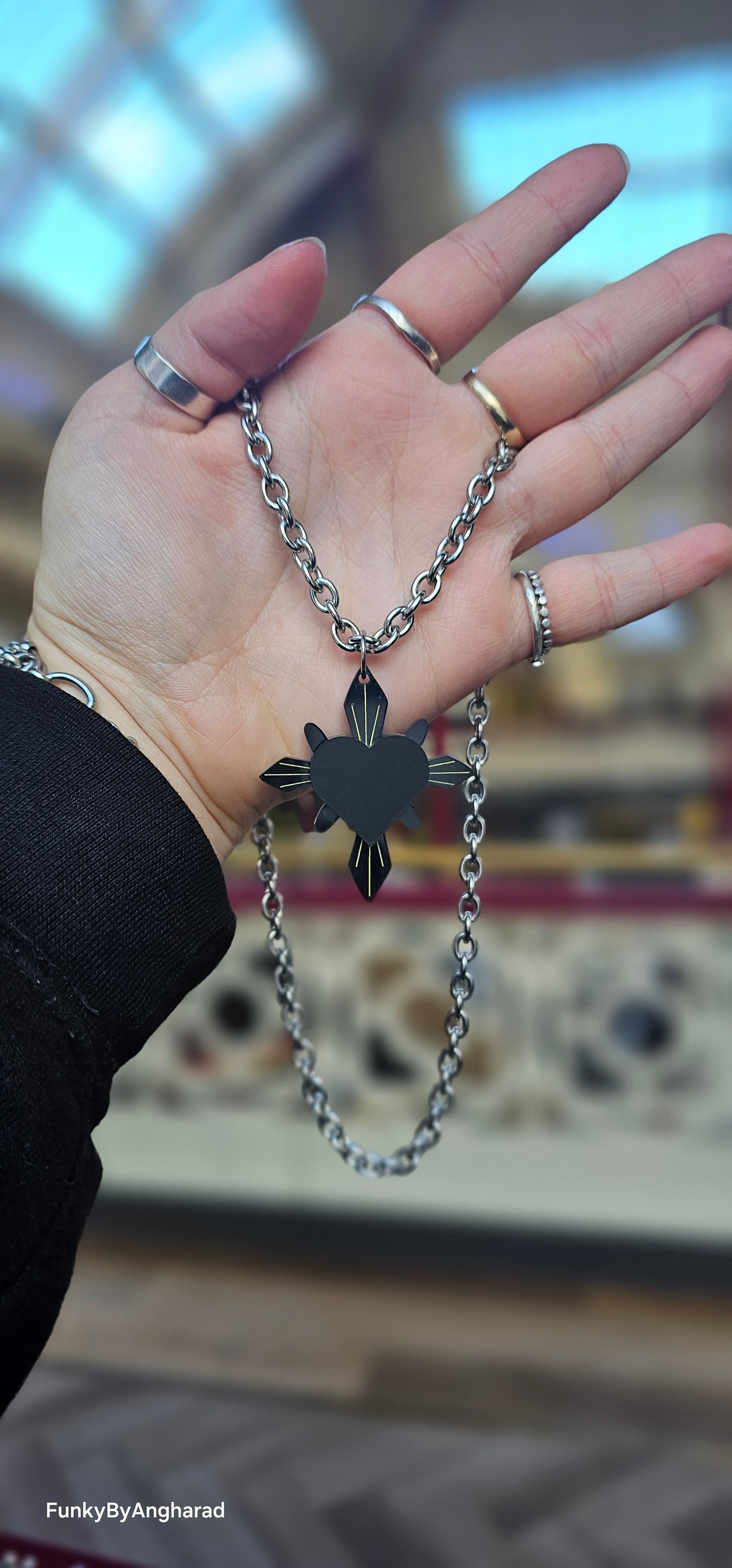 Black haunted heart necklace