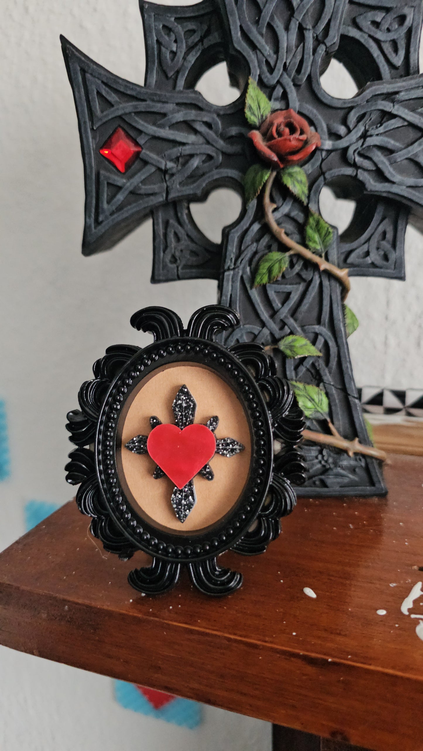 Glitter haunted hearts in frame