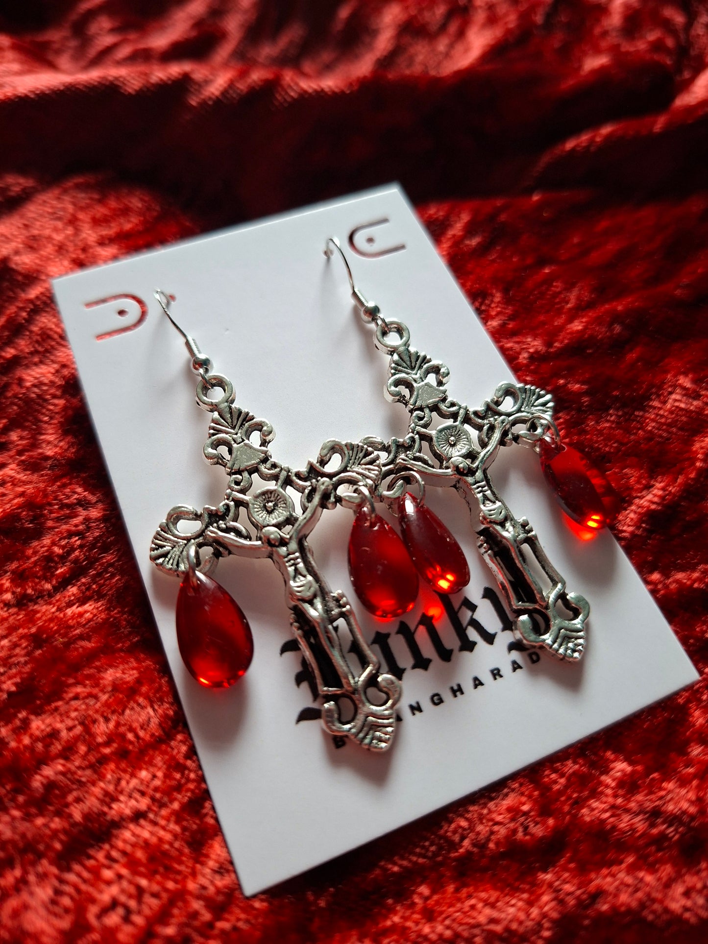 On the cross earrings