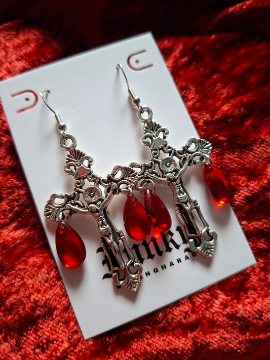 On the cross earrings