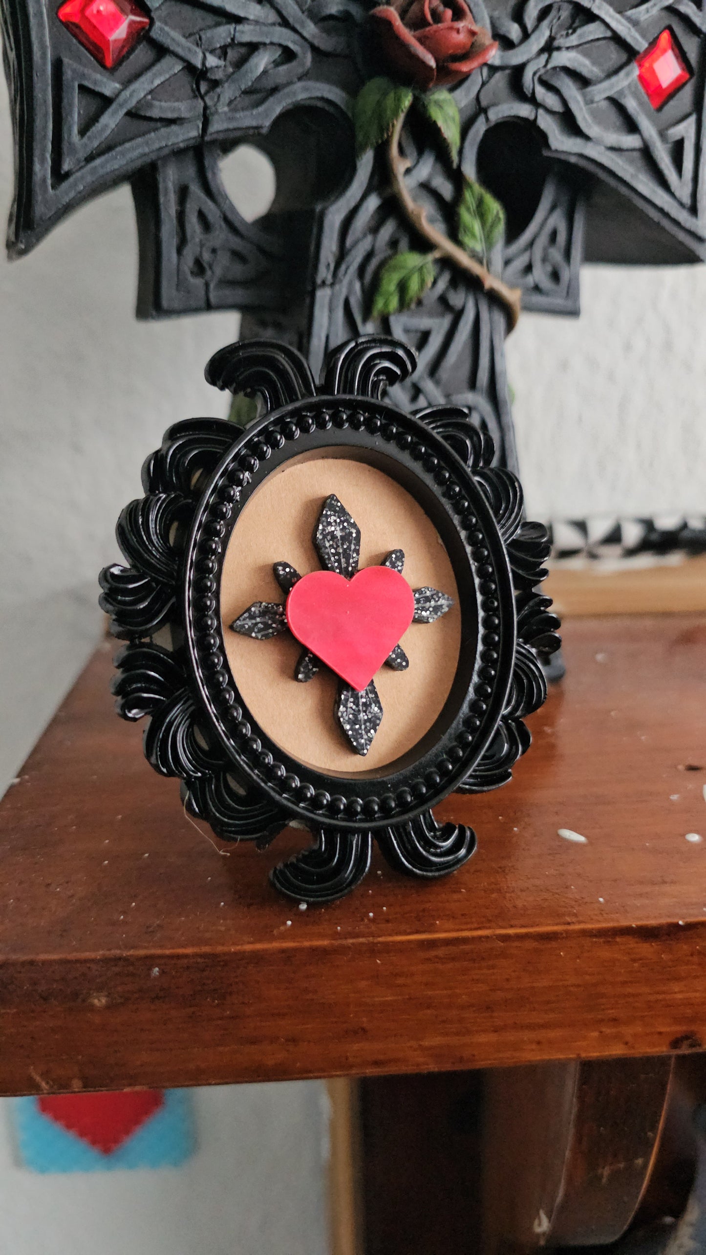 Glitter haunted hearts in frame