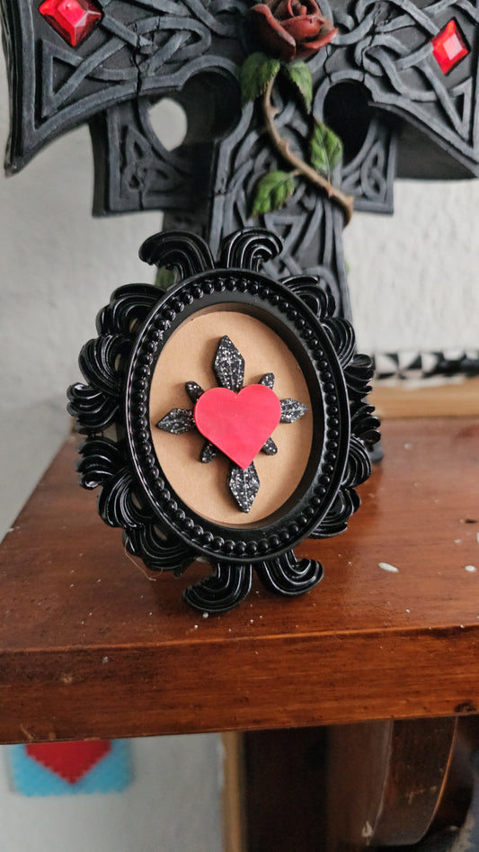 Glitter haunted hearts in frame