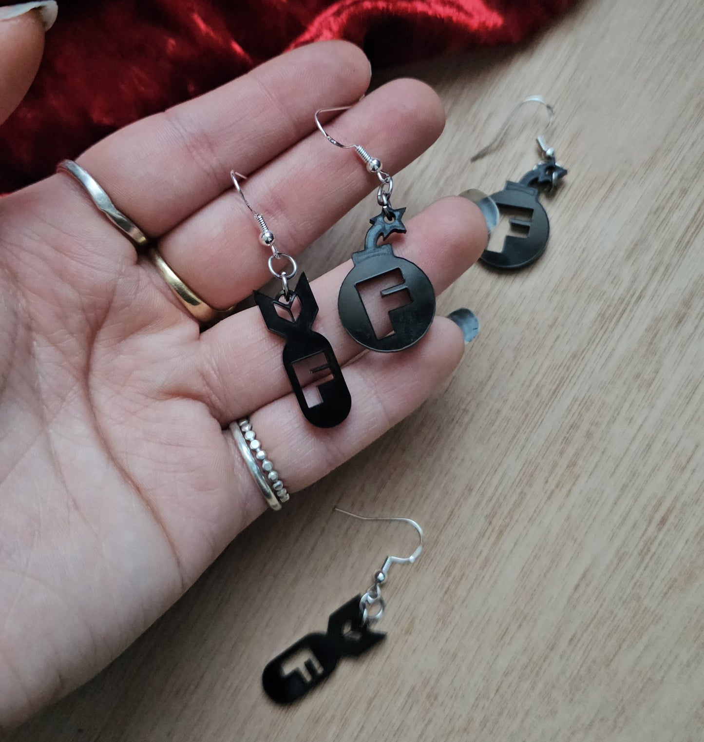 F bomb earrings