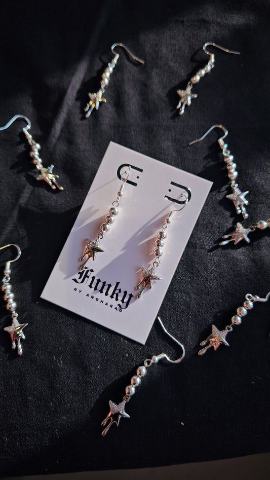 Dripping star earrings