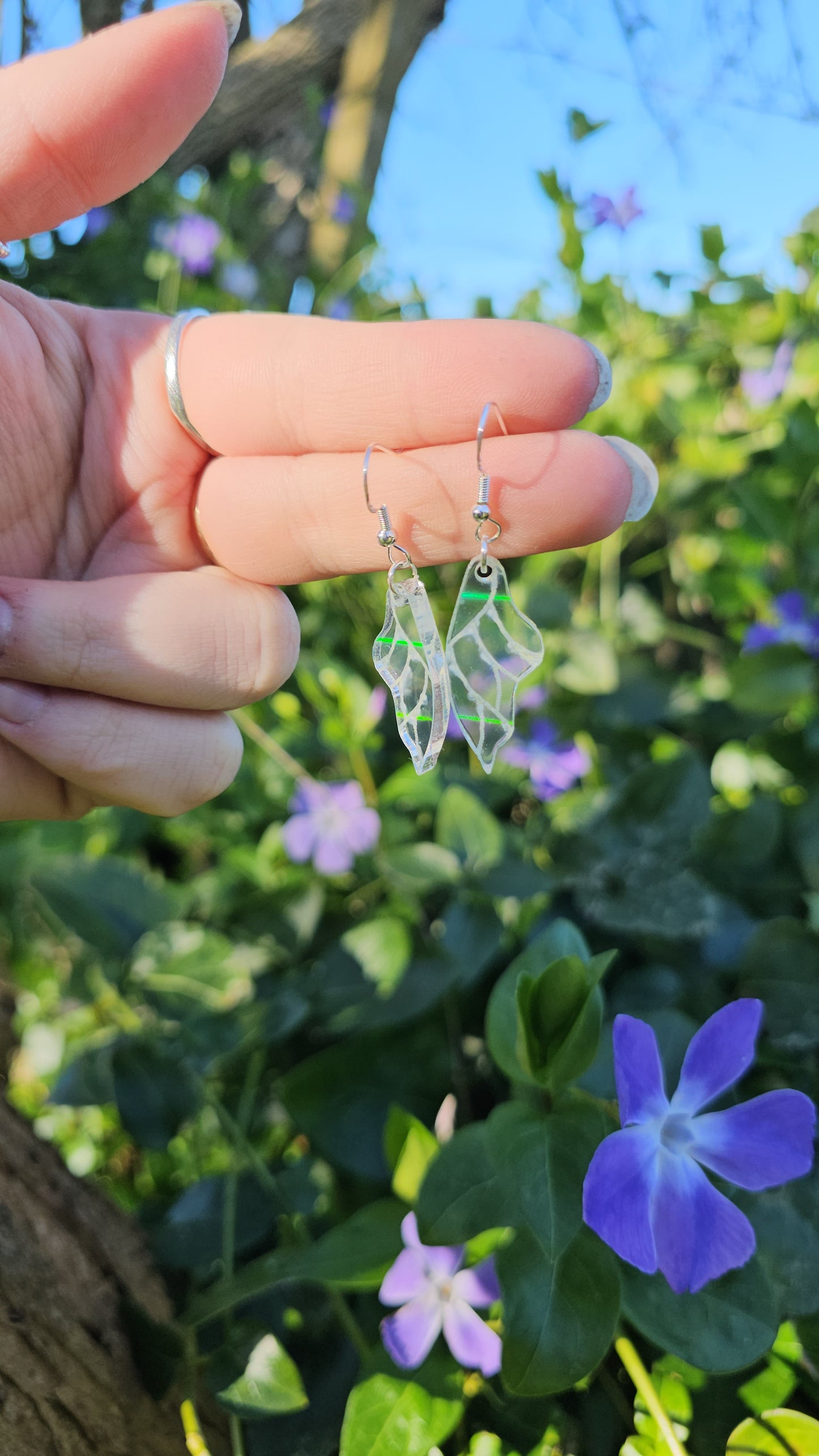 Holographic wing earrings