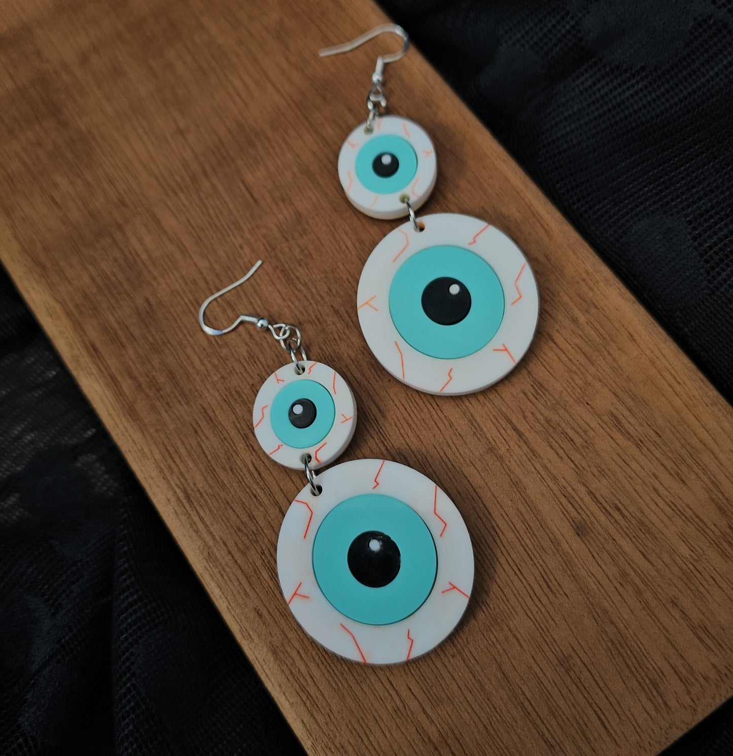 Blue eye earrings