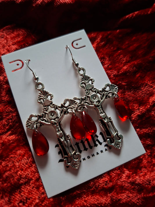 On the cross earrings